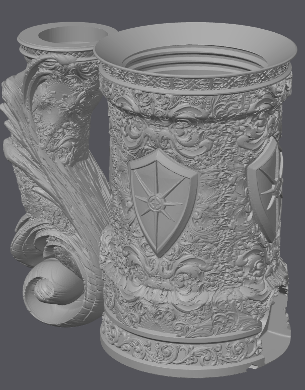 Decorative tankard with intricate designs and a shield emblem on a gray background